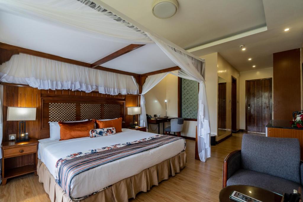 Postel nebo postele na pokoji v ubytování Ciala Resort Hotels In Kisumu