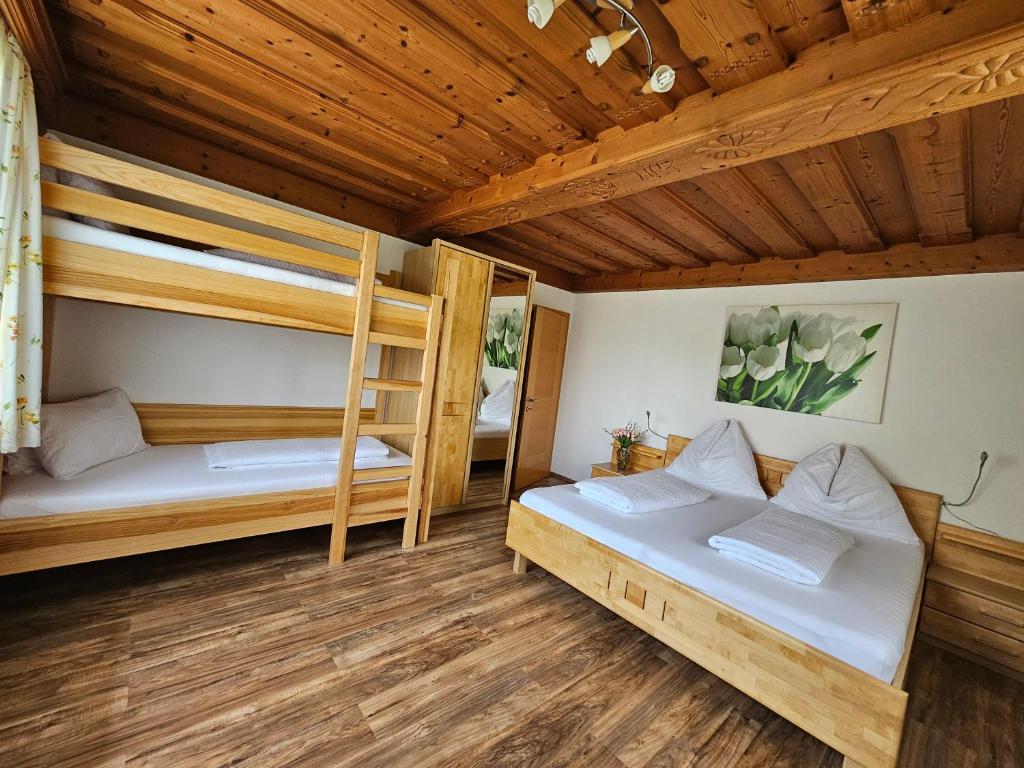 Postel nebo postele na pokoji v ubytování Appartement Seggl
