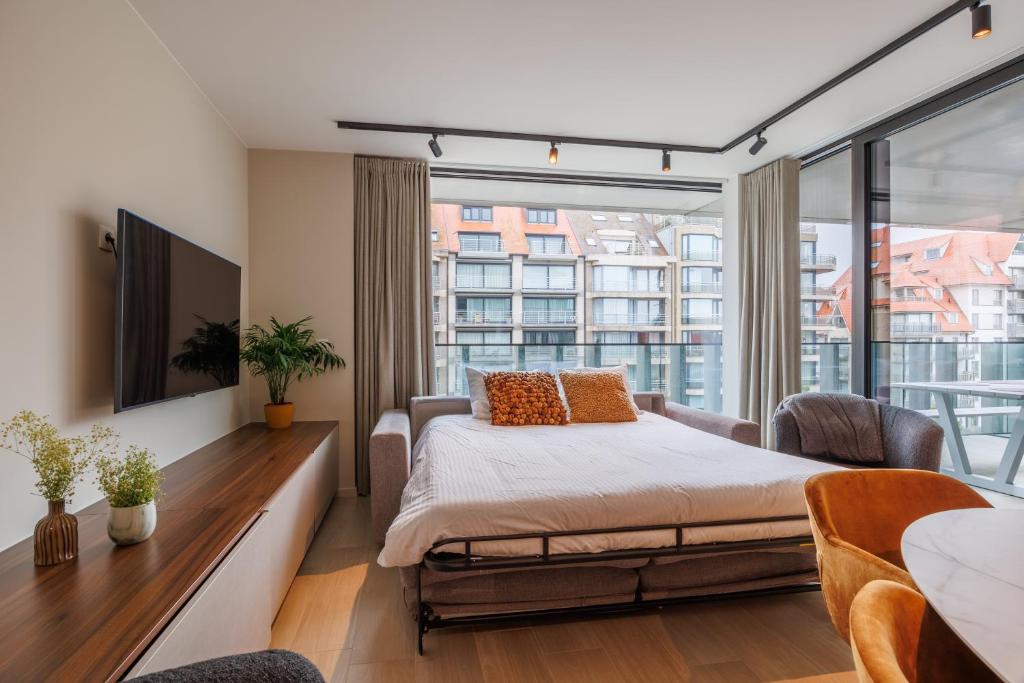 Ein Bett oder Betten in einem Zimmer der Unterkunft The CORNR Hotel