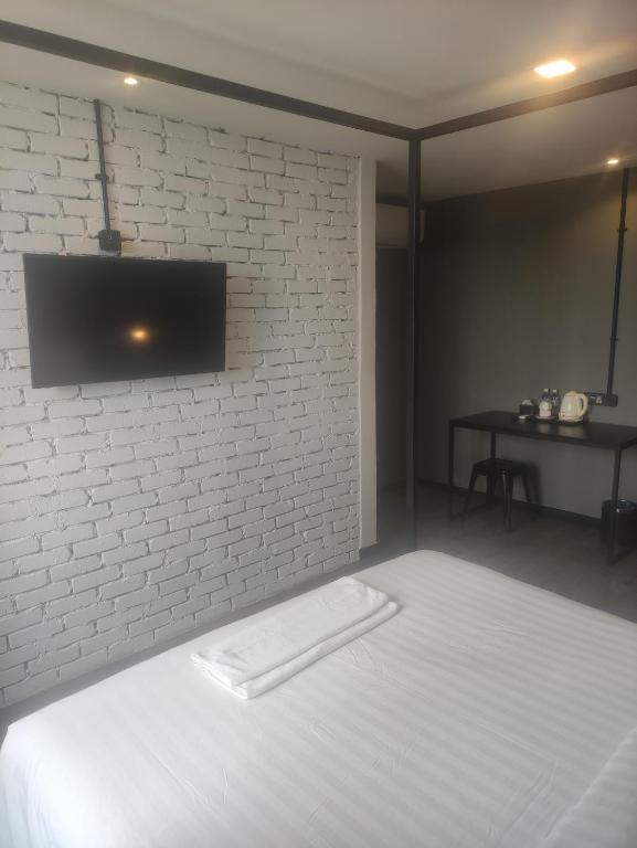 Postel nebo postele na pokoji v ubytování 68 Boutique Hotel