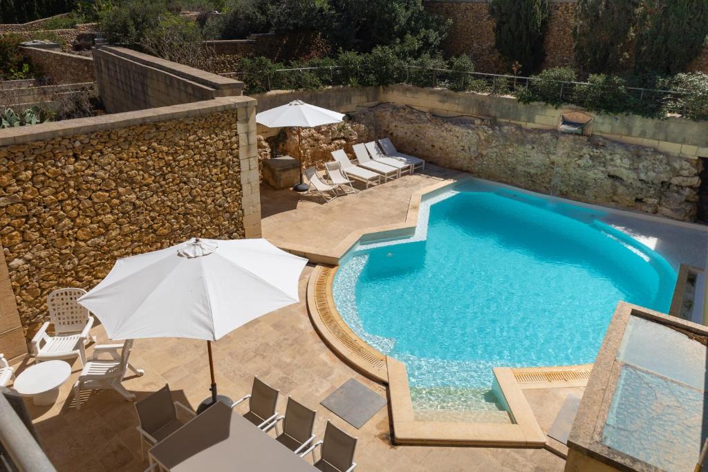 Bazén v ubytování OneFifty Holiday Home nebo v jeho okolí