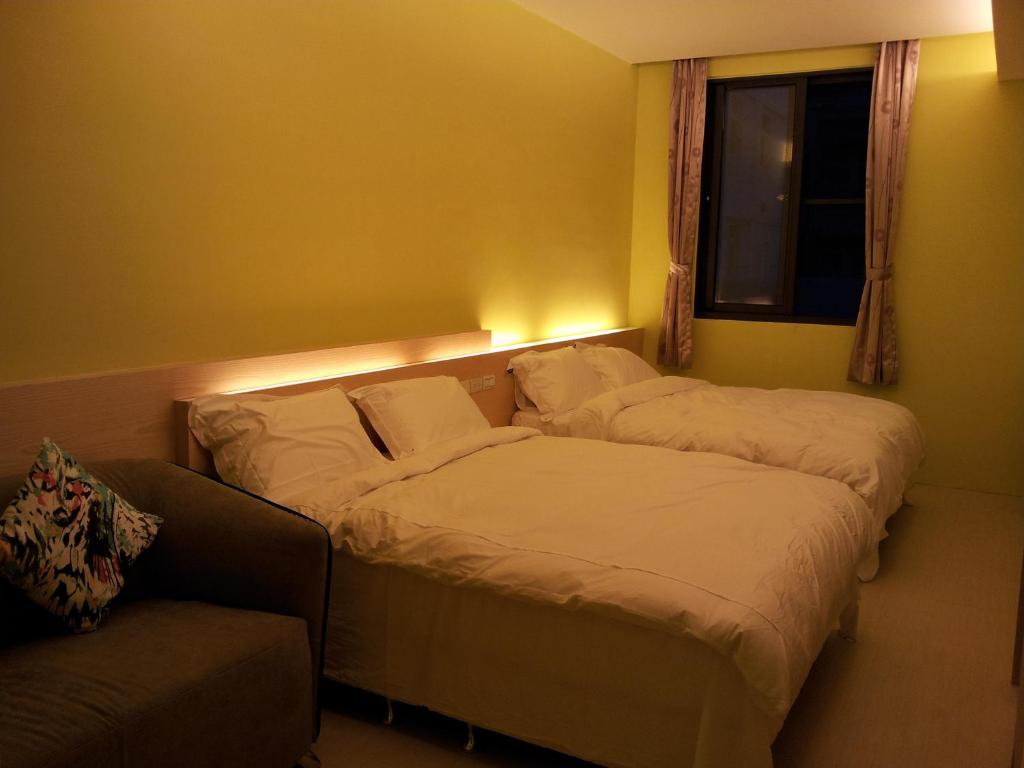Postel nebo postele na pokoji v ubytování Haliluya Homestay