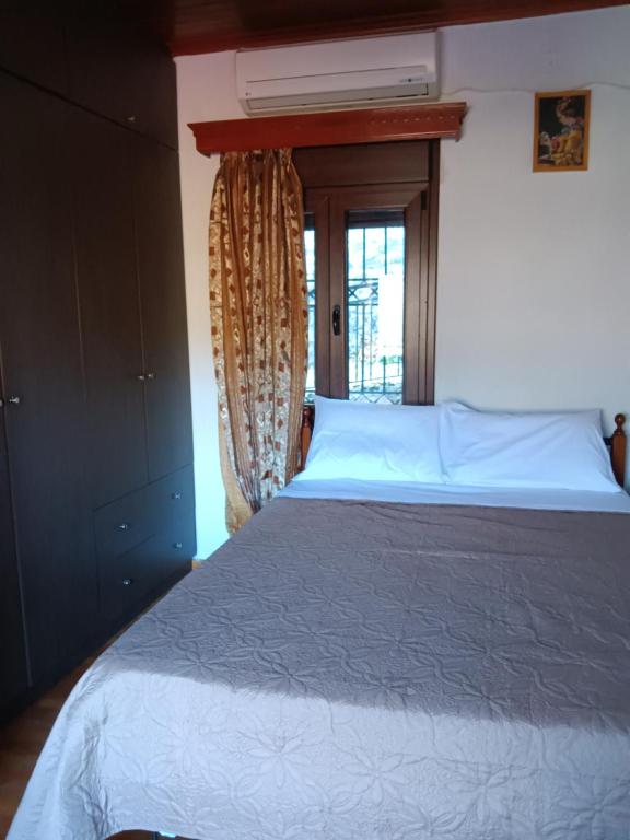Postel nebo postele na pokoji v ubytování Anilio Casa 1