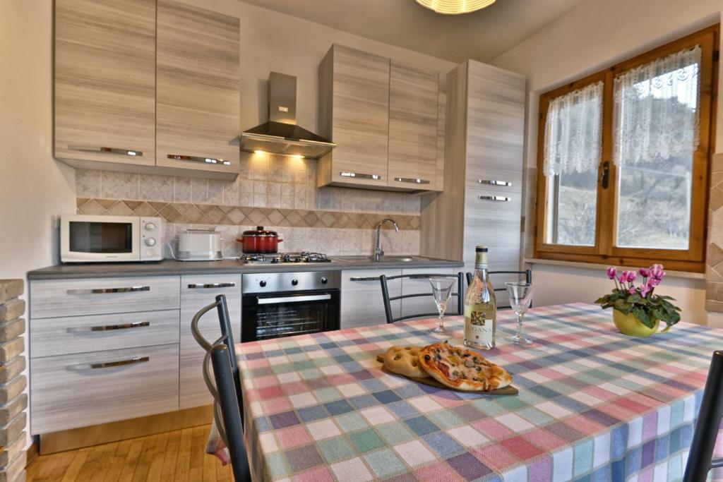 Kuchyň nebo kuchyňský kout v ubytování Rustico Massimo - Theater Home