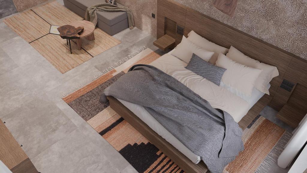 Postel nebo postele na pokoji v ubytování F Fine Suites - Adults Only
