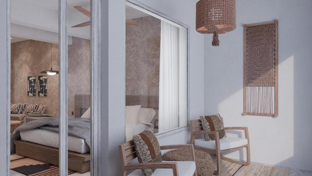 Postel nebo postele na pokoji v ubytování F Fine Suites - Adults Only
