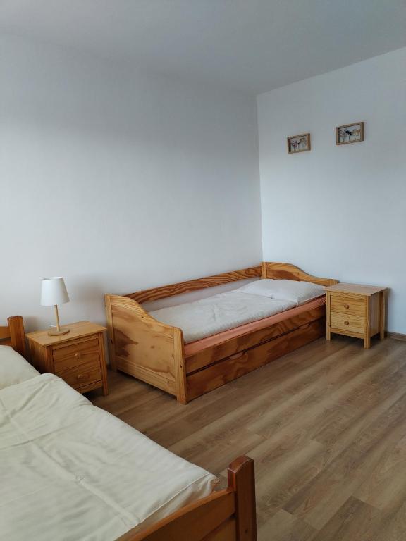 Posteľ alebo postele v izbe v ubytovaní Turistická ubytovňa Hornád