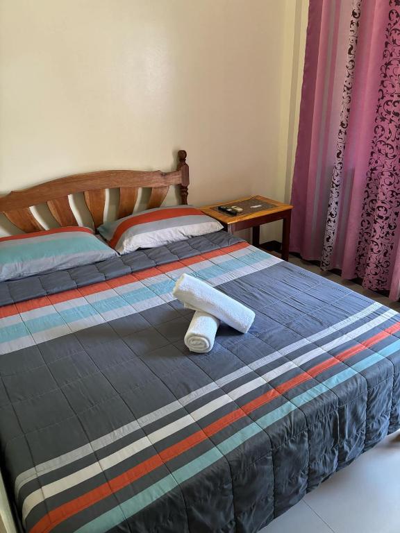 Postel nebo postele na pokoji v ubytování DIAKOPES INN