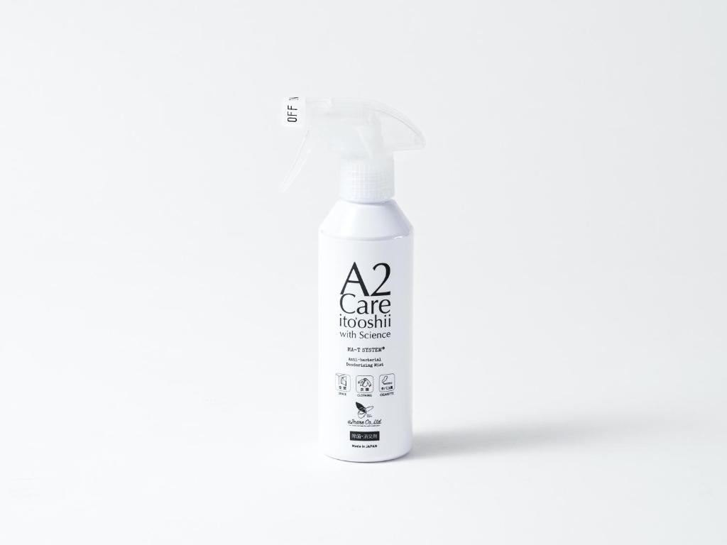 a bottle of aire nourishing cream on a white background at APA Hotel Ningyocho Ekikita in Tokyo