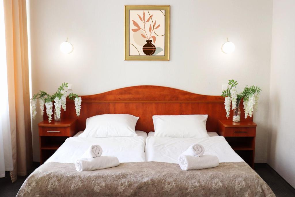 Postel nebo postele na pokoji v ubytování Hotel Polonia Centrum