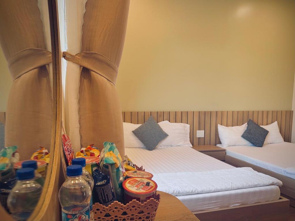 Giường trong phòng chung tại Gia An Hung Guest House