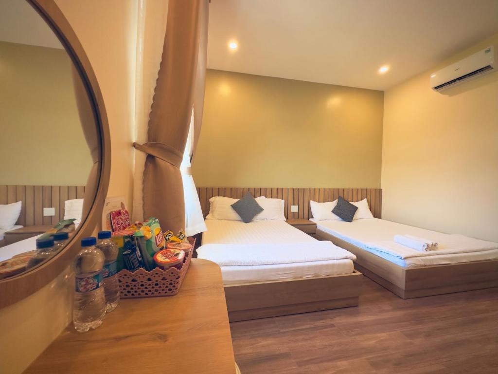 Giường trong phòng chung tại Gia An Hung Guest House
