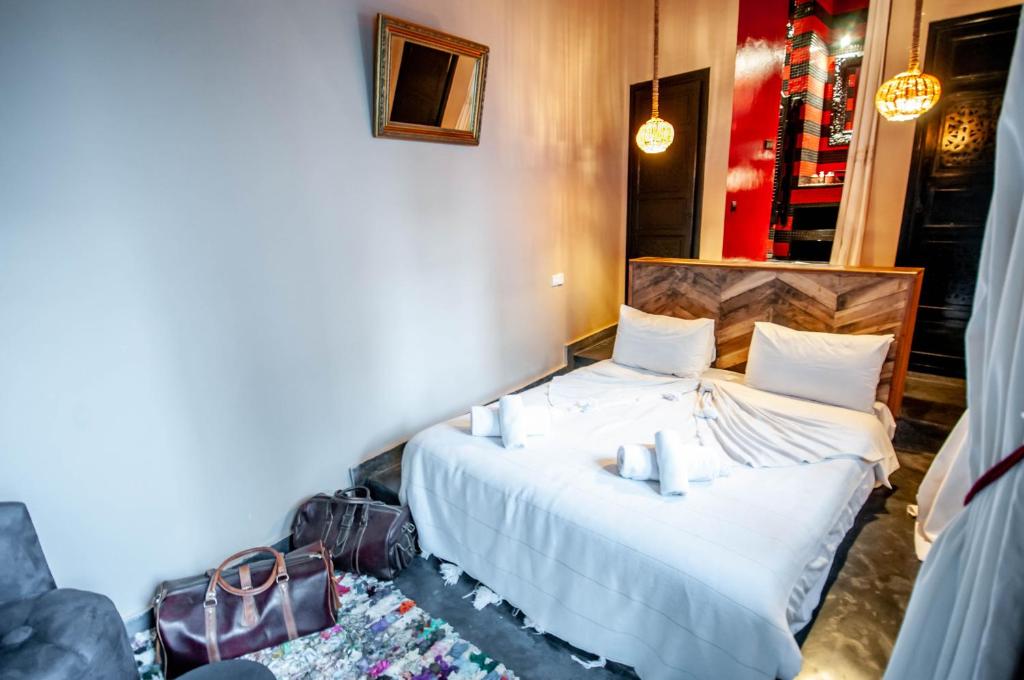 Postel nebo postele na pokoji v ubytování Riad Origines