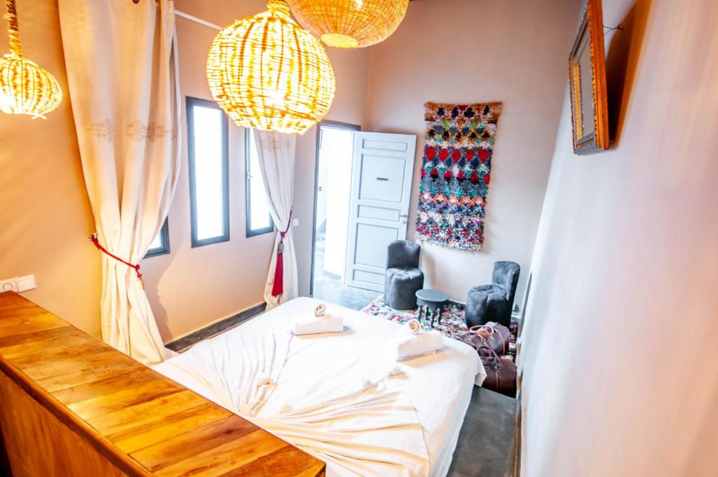 Postel nebo postele na pokoji v ubytování Riad Origines