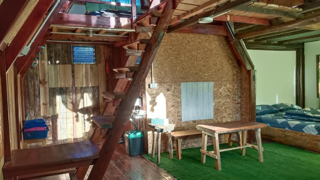 Postel nebo postele na pokoji v ubytování ไร่นิธิสุนทร nithisoonthon farmstay