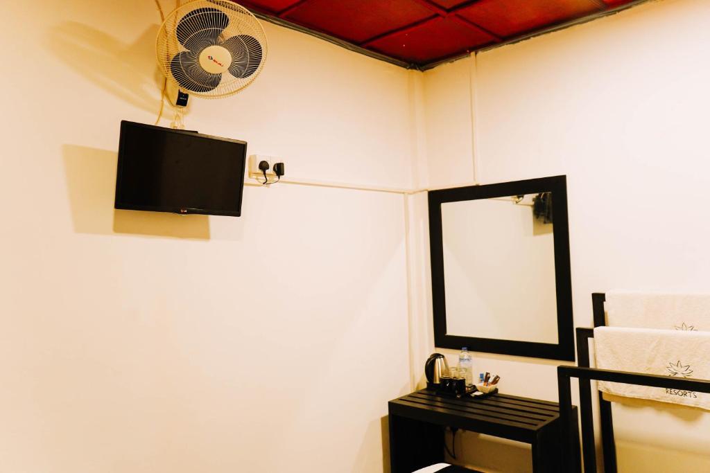 TV a/nebo společenská místnost v ubytování Abhaya Resorts