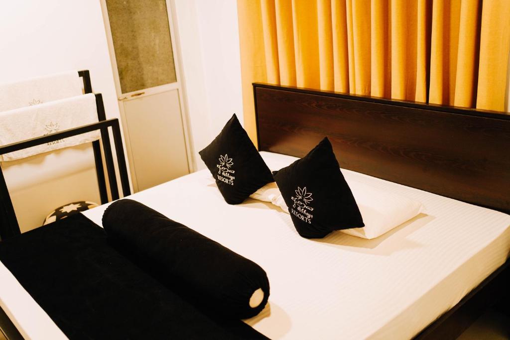 Postel nebo postele na pokoji v ubytování Abhaya Resorts