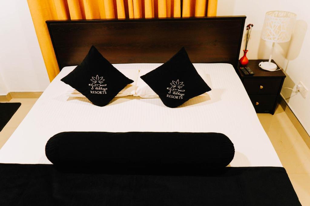 Postel nebo postele na pokoji v ubytování Abhaya Resorts