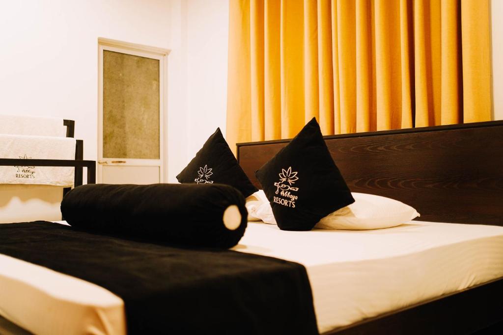 Postel nebo postele na pokoji v ubytování Abhaya Resorts