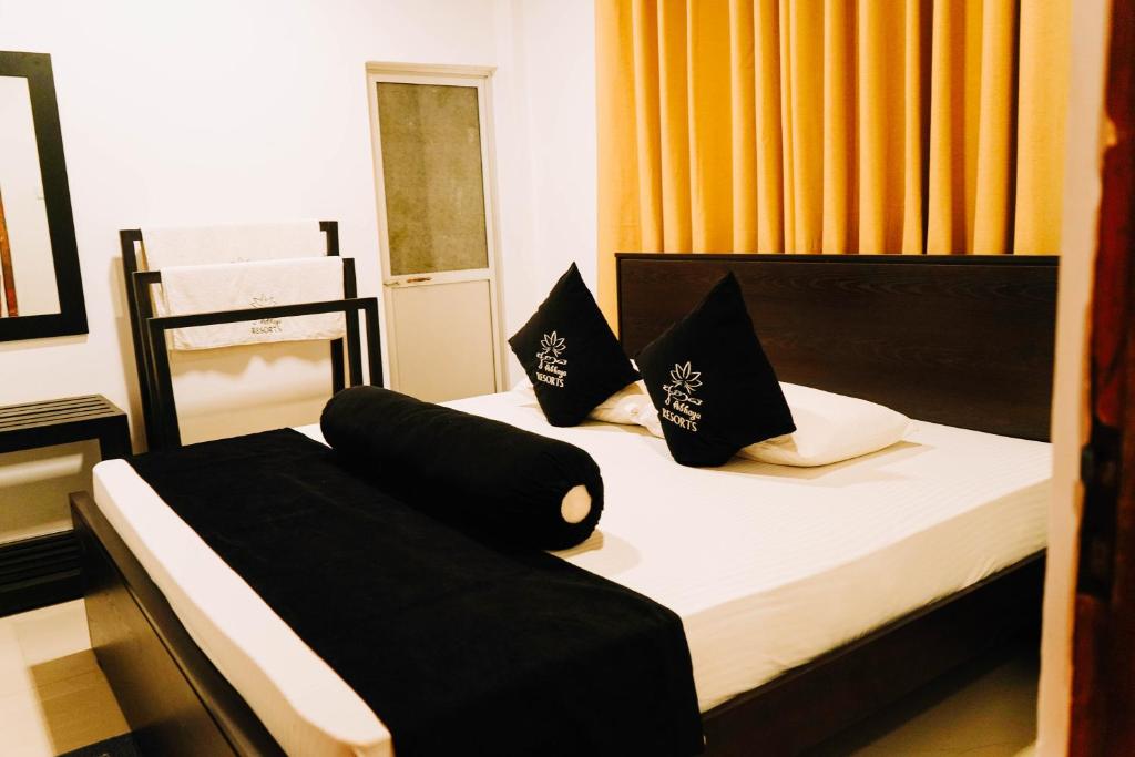 Postel nebo postele na pokoji v ubytování Abhaya Resorts