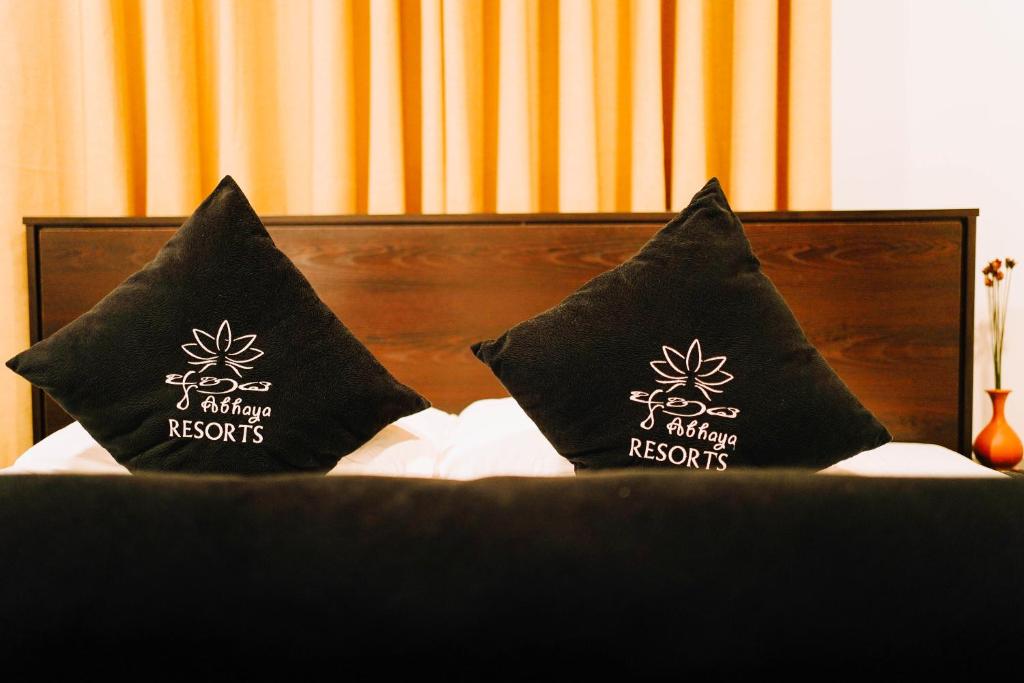 Postel nebo postele na pokoji v ubytování Abhaya Resorts