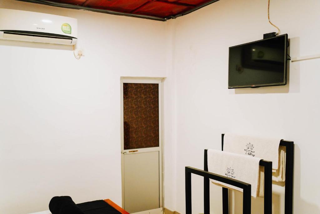 TV a/nebo společenská místnost v ubytování Abhaya Resorts