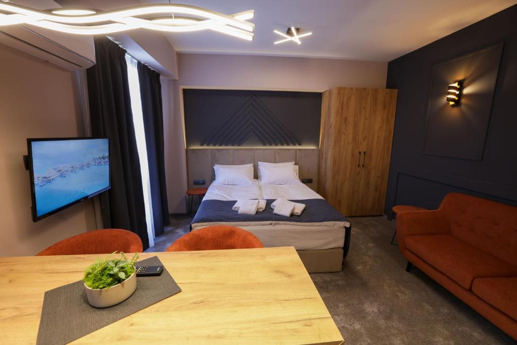 Voodi või voodid majutusasutuse Nest Suites toas