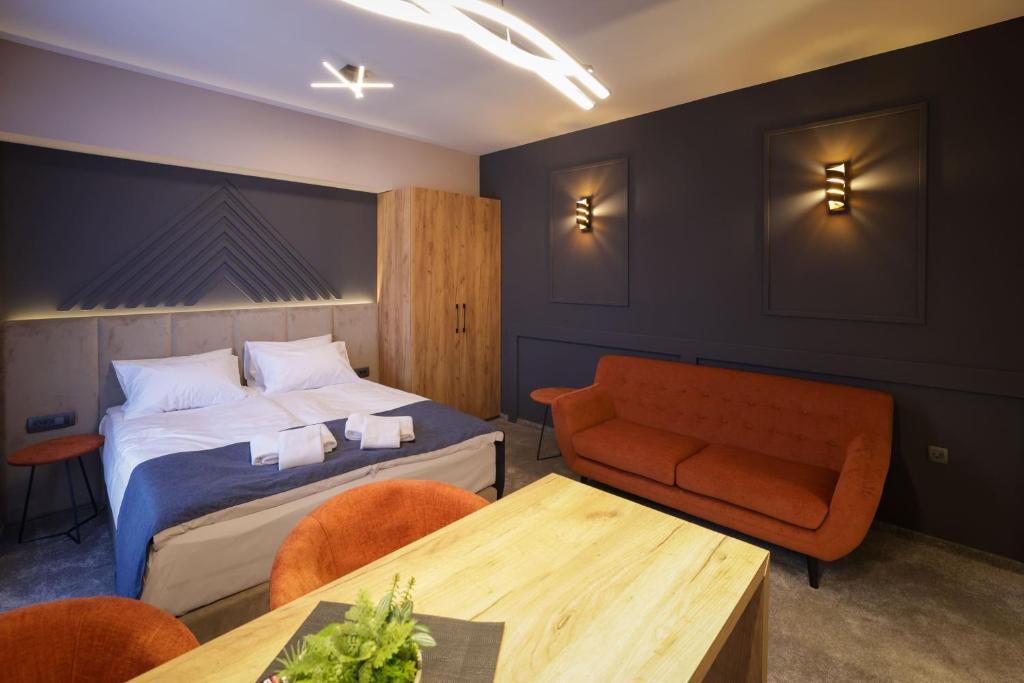 Voodi või voodid majutusasutuse Nest Suites toas