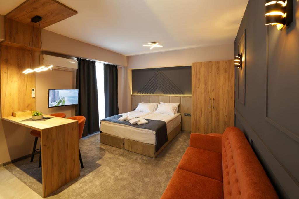 Voodi või voodid majutusasutuse Nest Suites toas
