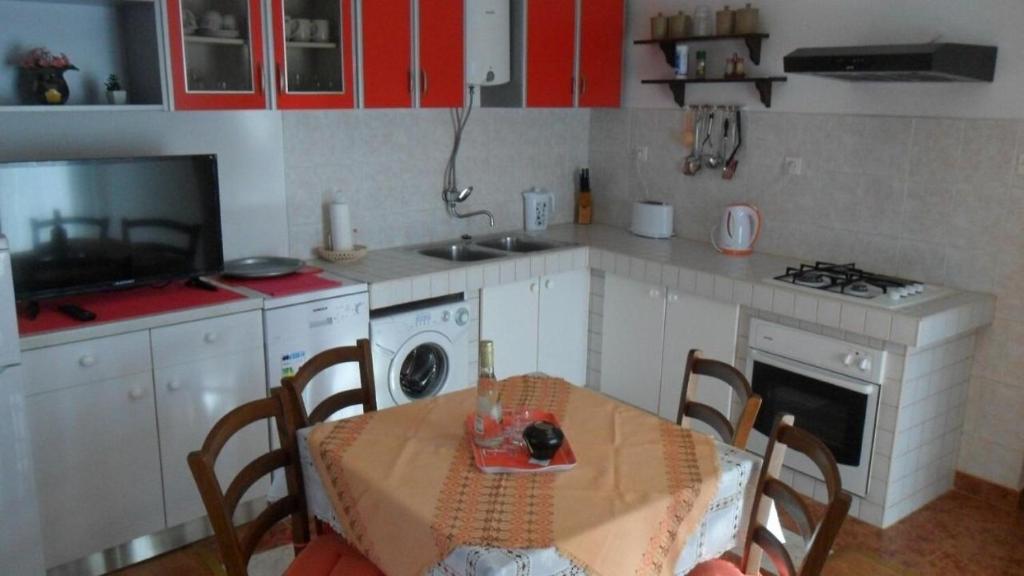 Kuchyňa alebo kuchynka v ubytovaní Apartment Ralje