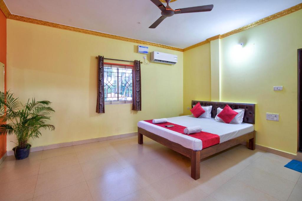Hotel Savita Calangute客房内的一张或多张床位