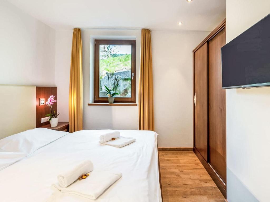 Posteľ alebo postele v izbe v ubytovaní Apartment Emma-5 by Interhome