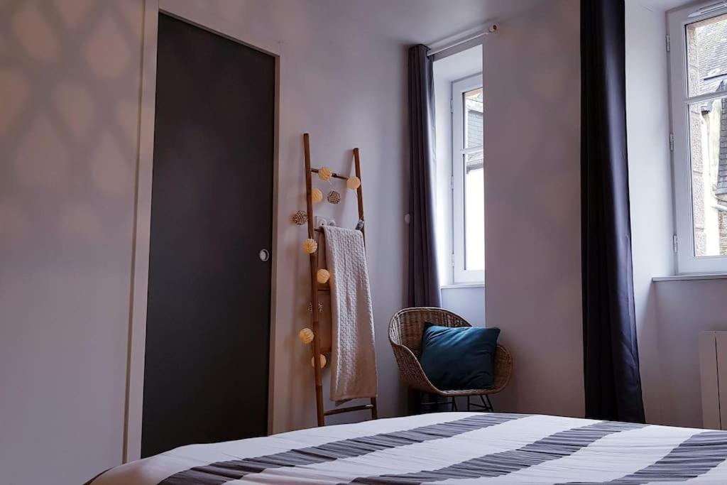 Postel nebo postele na pokoji v ubytování Le Saint-Nicolas
