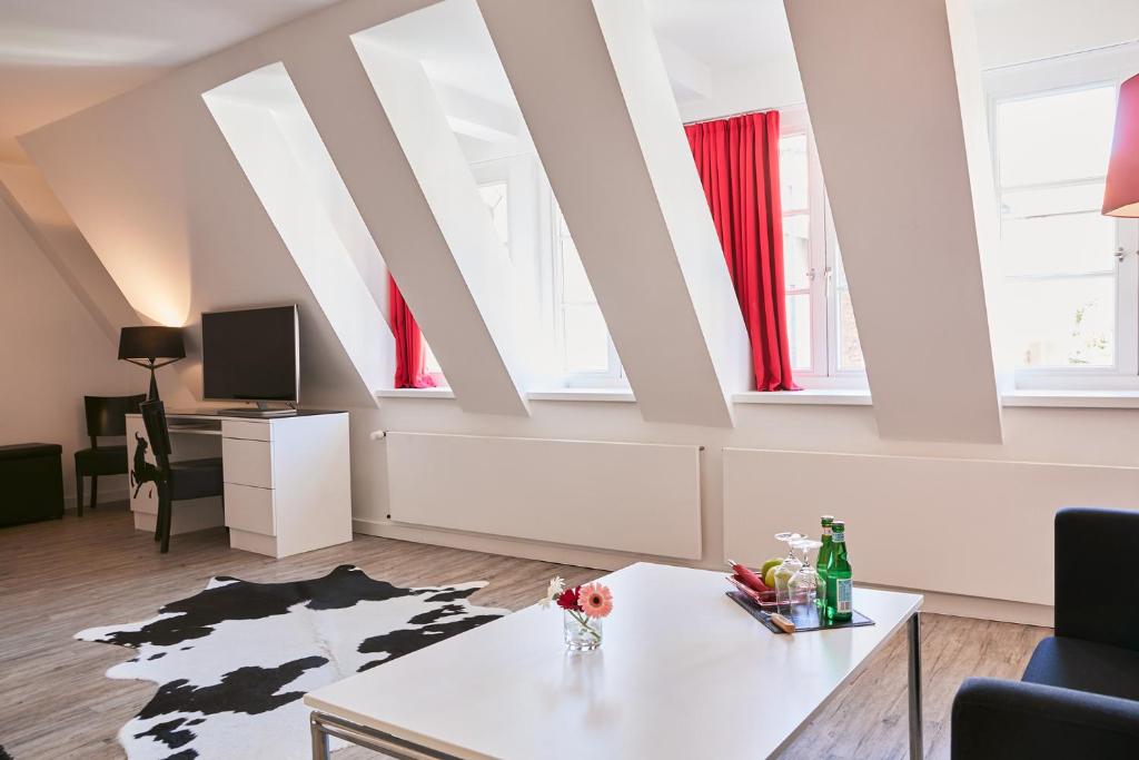 TV a/nebo společenská místnost v ubytování Hotel im Haus zur Hanse