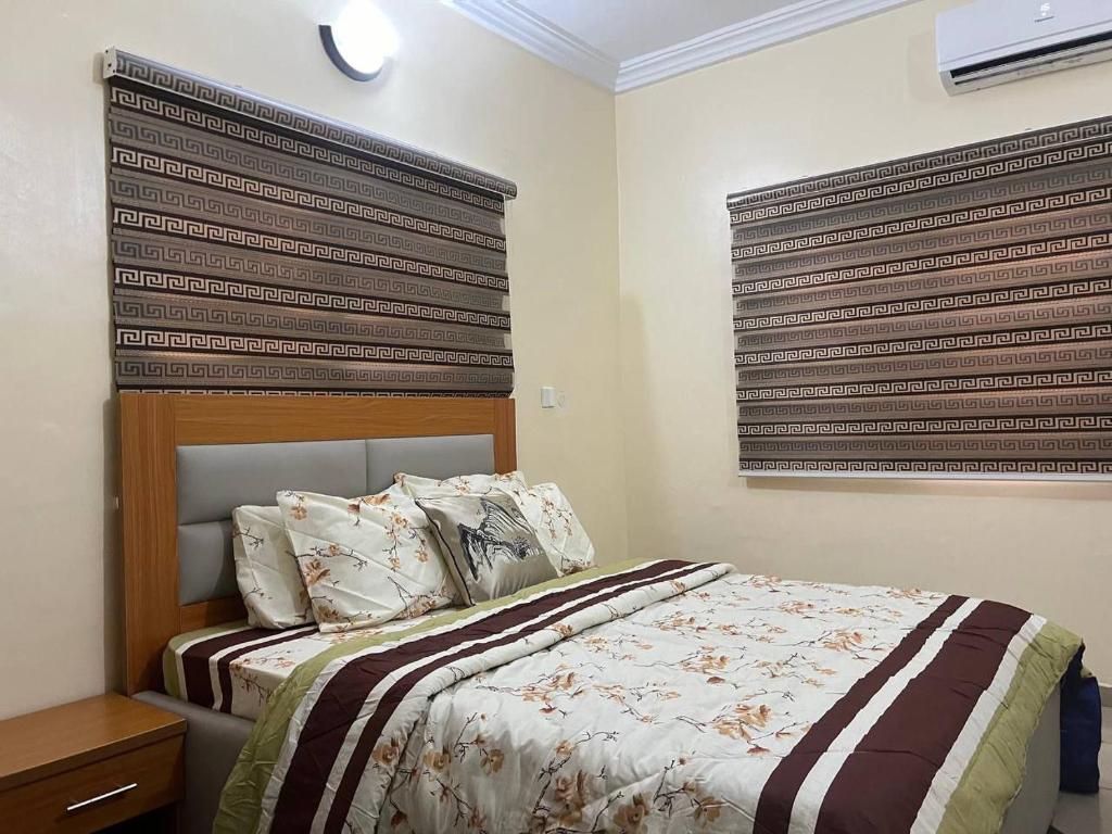 Postel nebo postele na pokoji v ubytování Rehoboth Homes