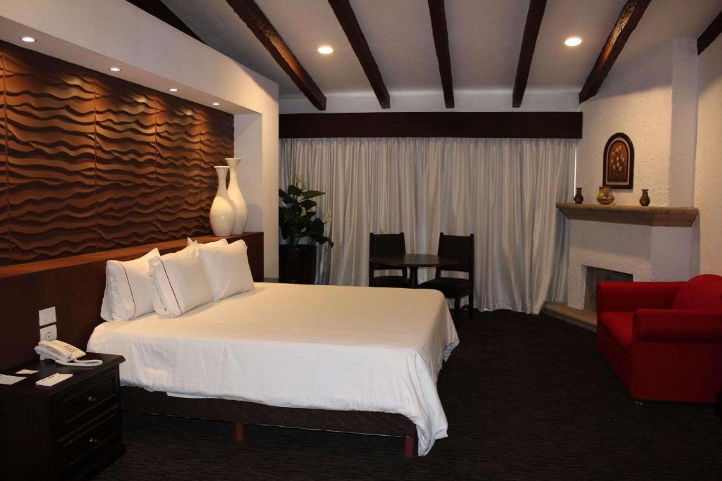 Postel nebo postele na pokoji v ubytování Radisson Hotel Tapatio Guadalajara Aeropuerto