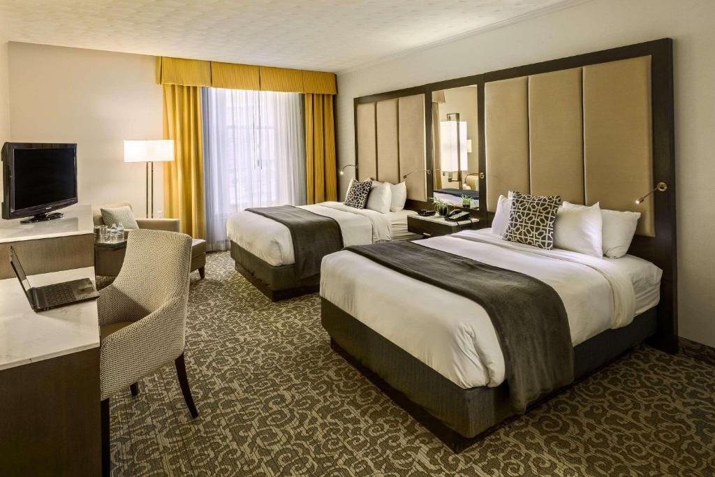 Postel nebo postele na pokoji v ubytování Radisson Lackawanna Station Hotel Scranton