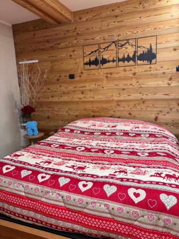 Postel nebo postele na pokoji v ubytování Residenze Vezza - Il Larice -