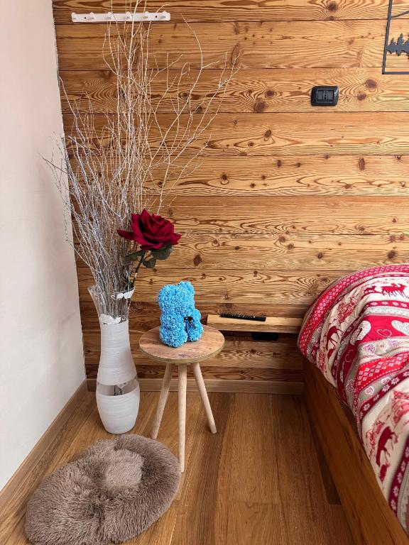 Postel nebo postele na pokoji v ubytování Residenze Vezza - Il Larice -