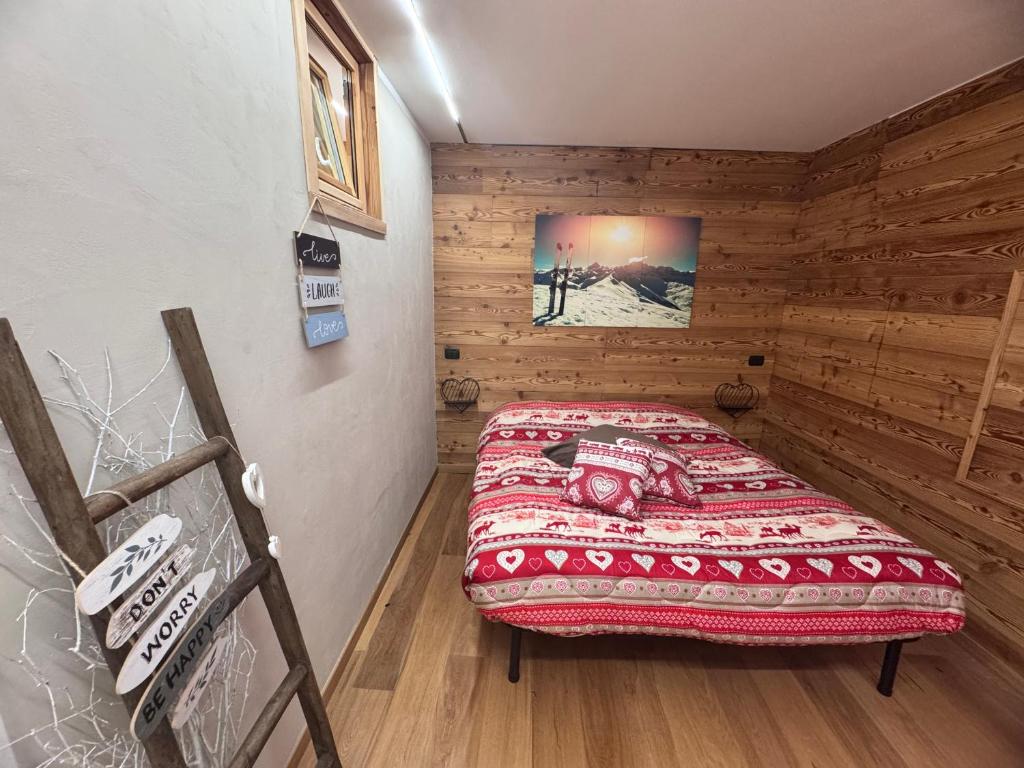 Postel nebo postele na pokoji v ubytování Residenze Vezza - Il Larice -