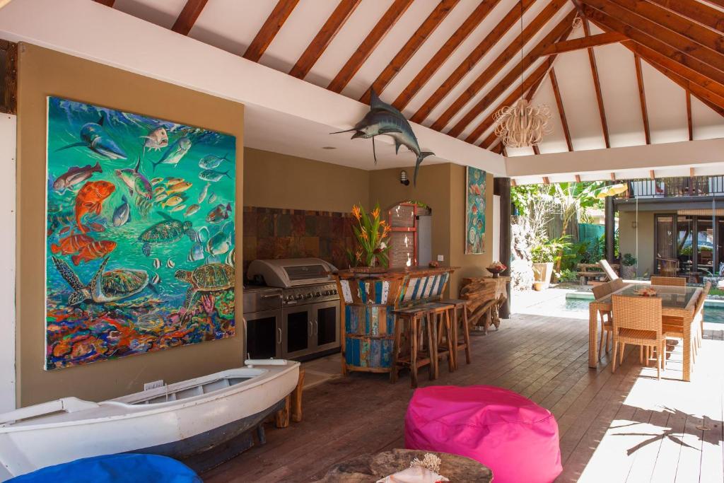 Posezení v ubytování Villas des Alizes beachfront suites and garden villas