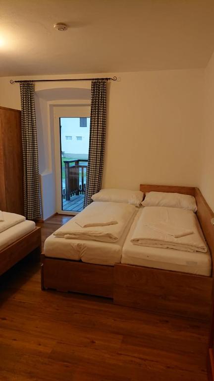 Postel nebo postele na pokoji v ubytování Alte Schule