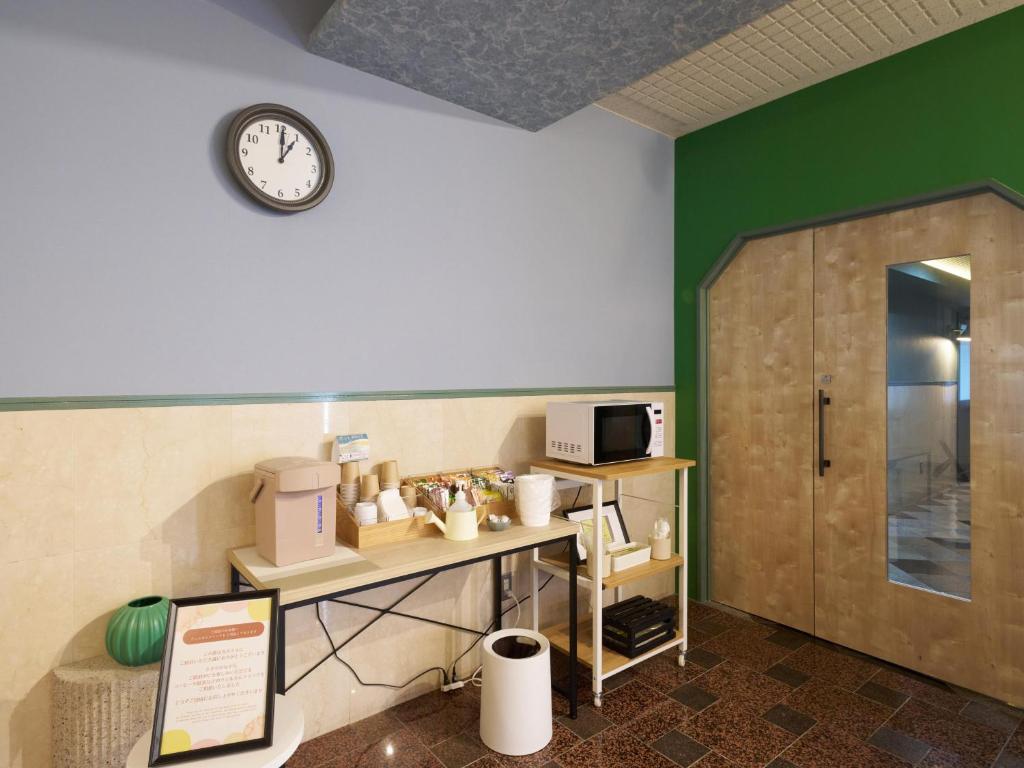 Kuchyň nebo kuchyňský kout v ubytování Hotel Village