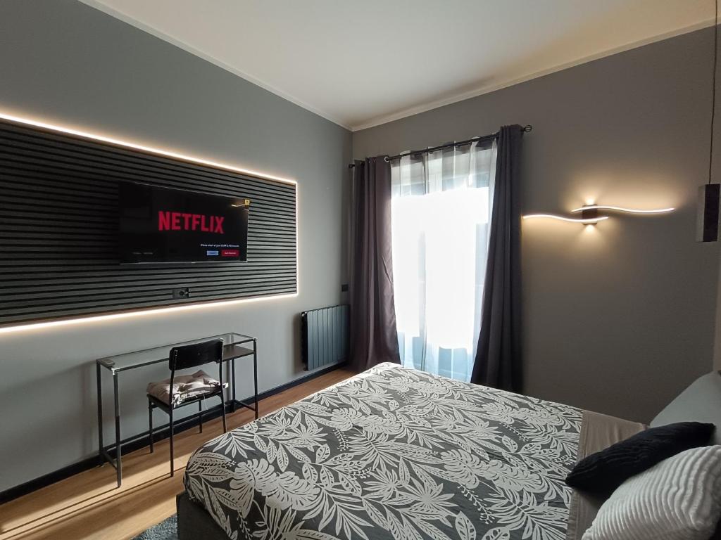 Postel nebo postele na pokoji v ubytování Trastevere Noir