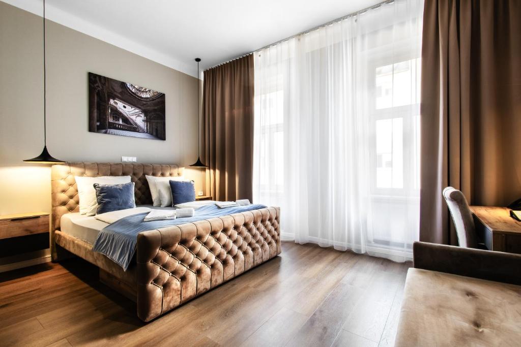 Postel nebo postele na pokoji v ubytování Vayalen Boutique Hotel