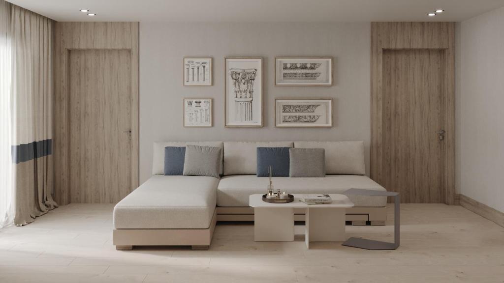 a living room with a couch and a table at Ducale Lara - Ultra All Inclusive in Lara
