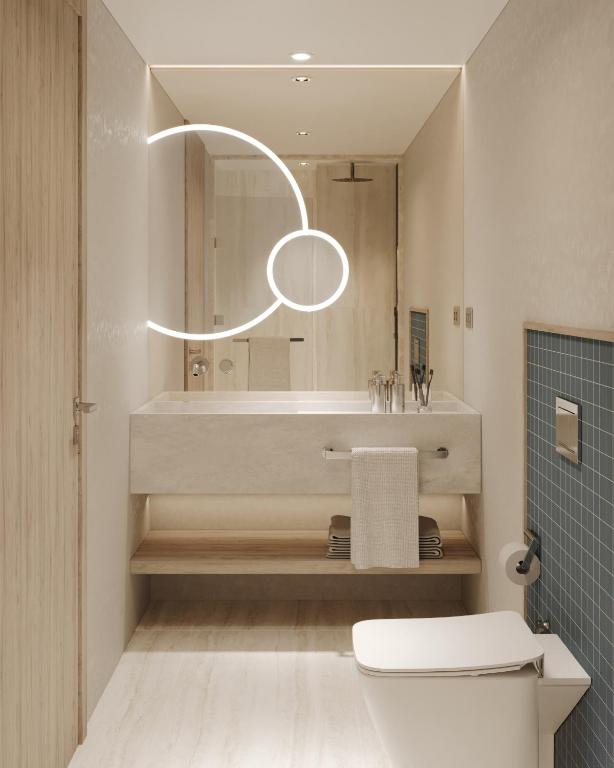 a bathroom with a sink and a mirror at Ducale Lara - Ultra All Inclusive in Lara