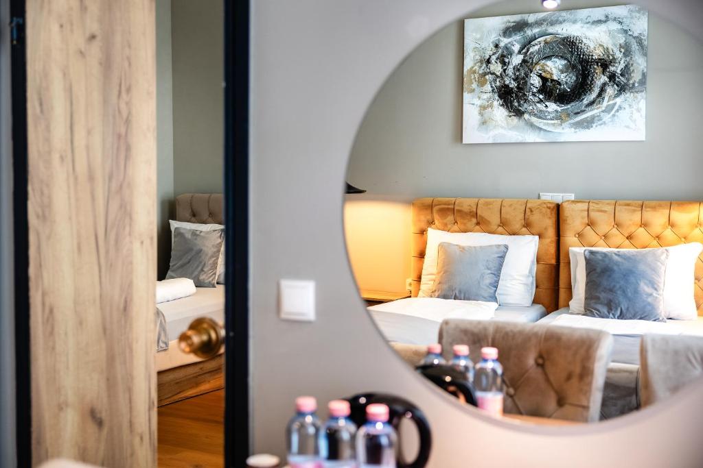 Postel nebo postele na pokoji v ubytování Vayalen Boutique Hotel
