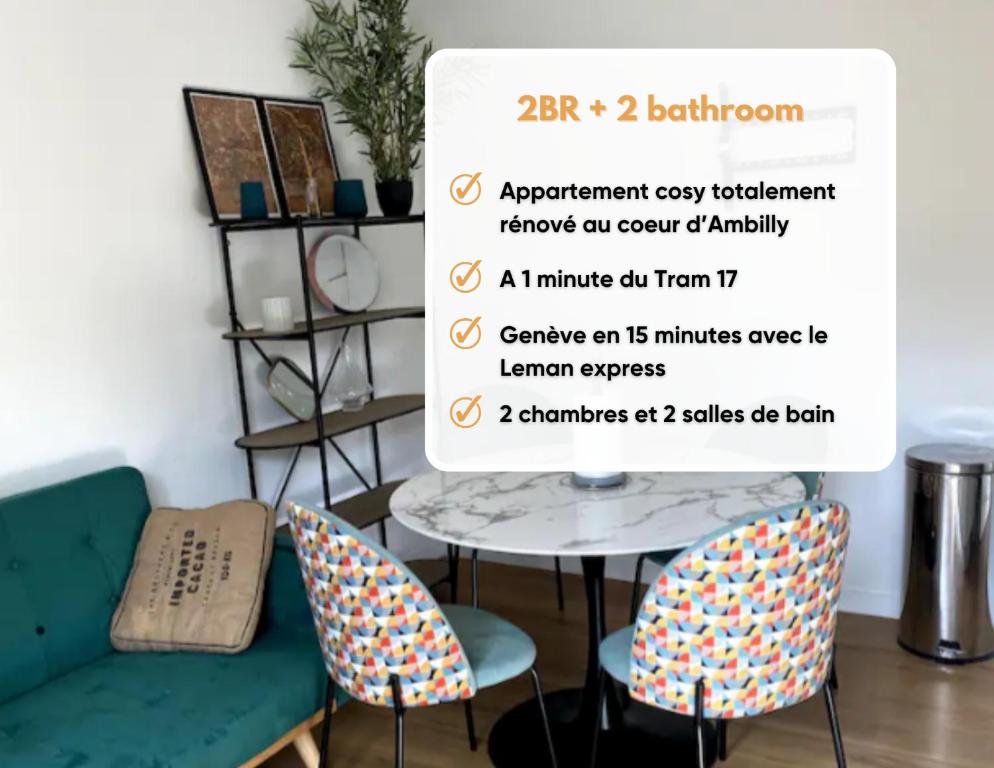 - une table et des chaises dans une pièce munie d'un panneau dans l'établissement 2BR 2 bathroom Geneva Tram 17, à Ambilly