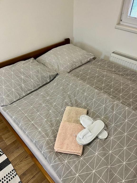 Postel nebo postele na pokoji v ubytování Ubytování Koliba pod Stolovou